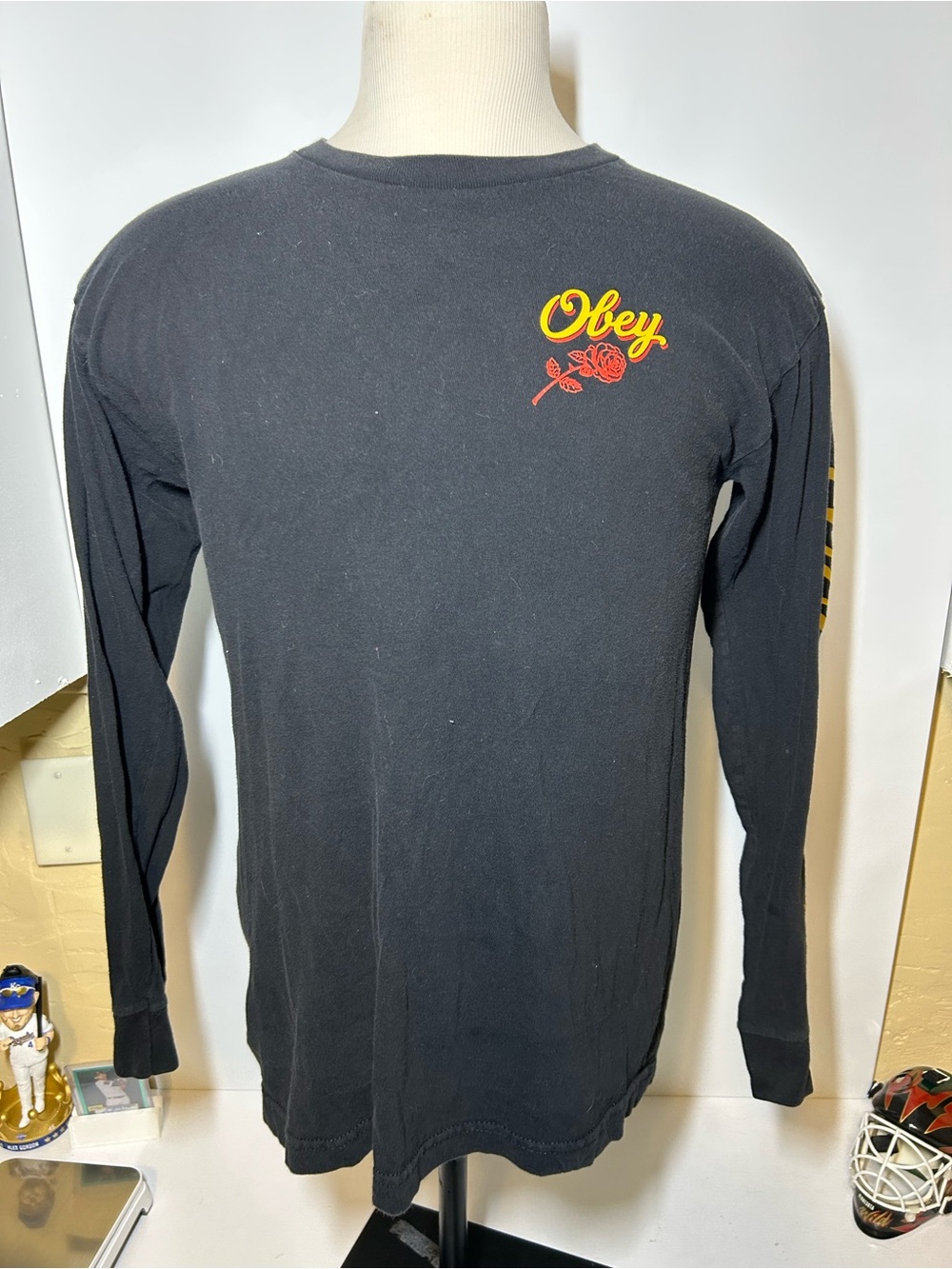 Obey Men’s Black Long-Sleeve Tee with Yellow & Red Rose Logo